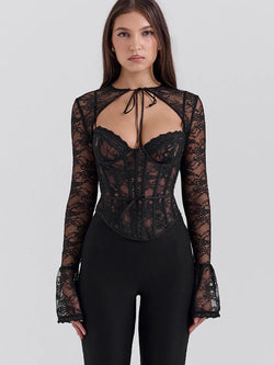 Hauts en dentelle transparente à manches longues noirs